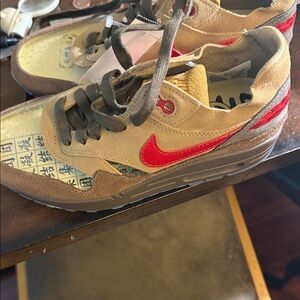Nike Kids Tan Suede Sneaker with Red Swoosh and Brown Sole